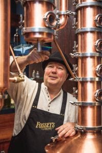 Steve Timmis standing in the Fossey's Distillery